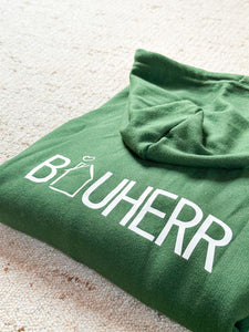 Dunkelgrüner Pullover Detailansicht Bauherr hinten. 