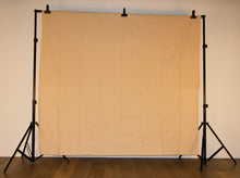 Laden Sie das Bild in den Galerie-Viewer, Hintergrund für eine Fotobox mit beigem Hintergrund 
